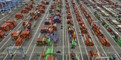 An aerial shot of large shipping containers area